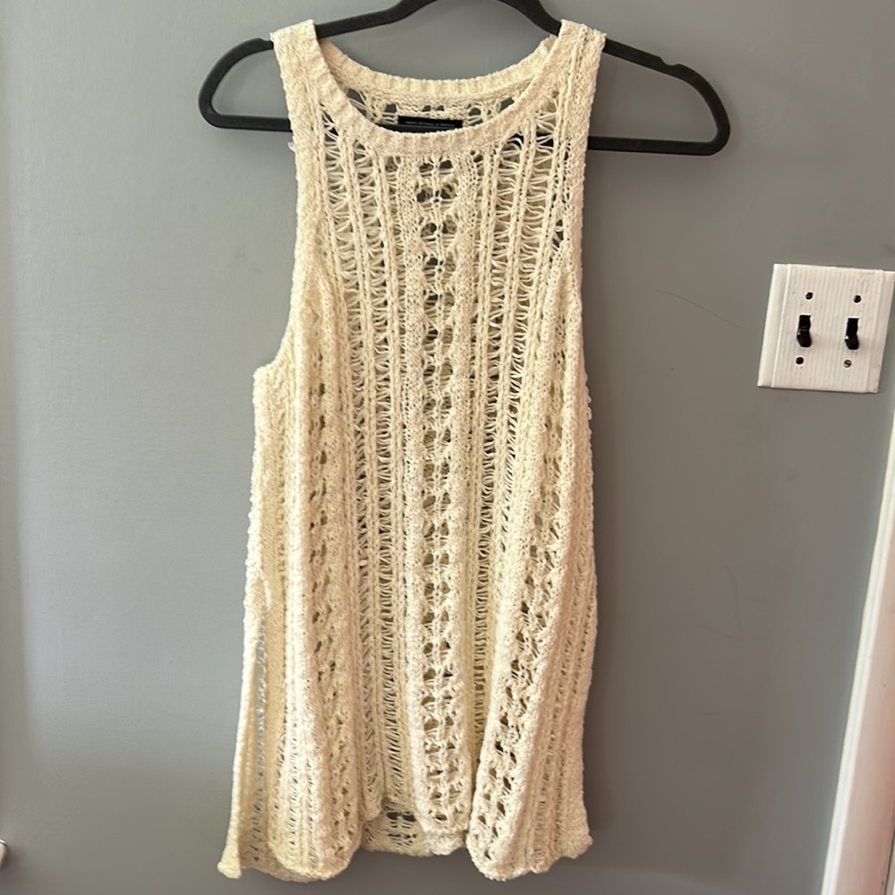 American Eagle Outfitters woman’s knit top. With two slits on the sides.